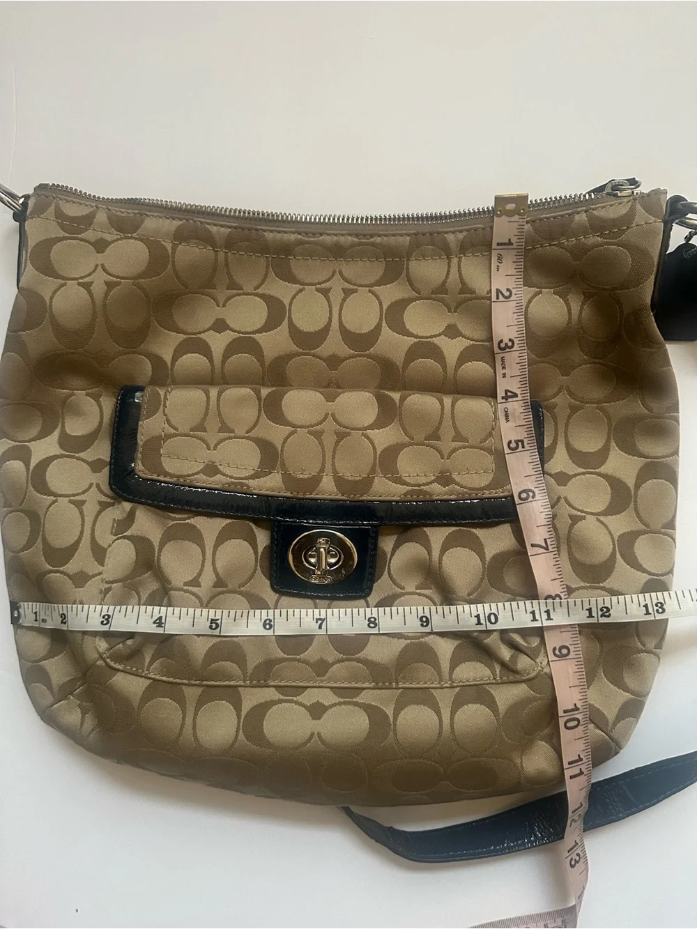 Coach Tan Signature Canvas Crossbody with Black Trim and Turn-Lock